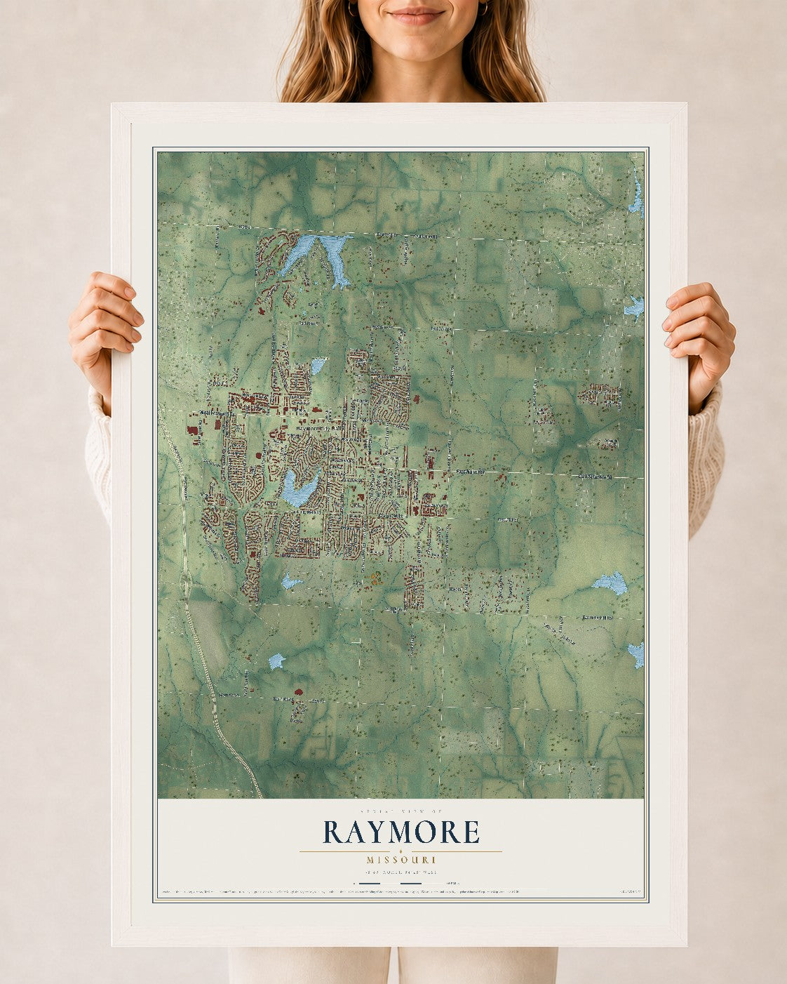 Map of Raymore, Missouri, 24 x 36 inch print in a white wood frame