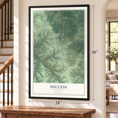 Success, Missouri map, 24 x 36 inch print in a black frame by a staircase