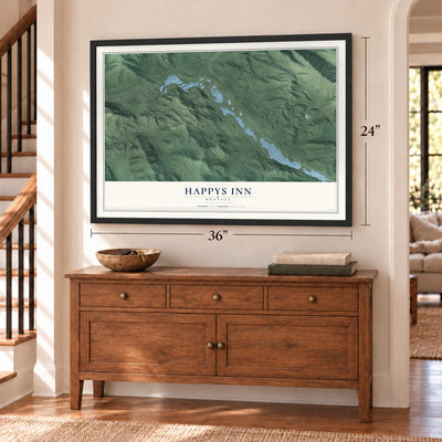 Happys Inn, Montana map, 24 x 36 inch print in a black frame above a dresser by a staircase