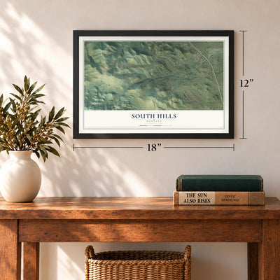 South Hills, Montana map, 12 x 18 inch print in a black frame in an entryway