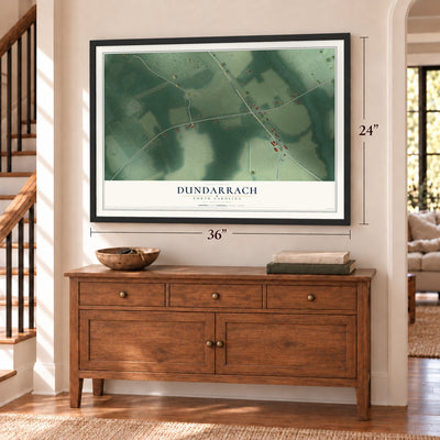 Dundarrach, North Carolina map, 24 x 36 inch print in a black frame above a dresser by a staircase