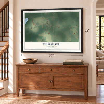 Milwaukee, North Carolina map, 24 x 36 inch print in a black frame above a dresser by a staircase