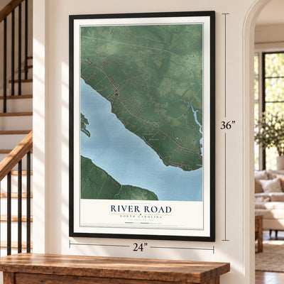 River Road, North Carolina map, 24 x 36 inch print in a black frame by a staircase