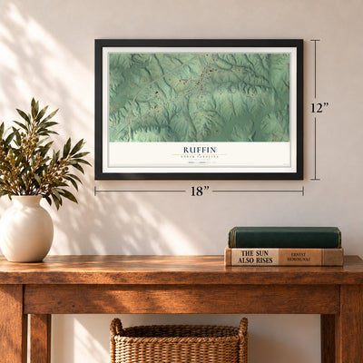 Ruffin, North Carolina map, 12 x 18 inch print in a black frame in an entryway