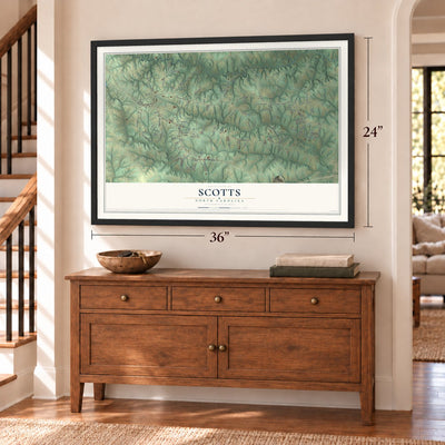 Scotts, North Carolina map, 24 x 36 inch print in a black frame above a dresser by a staircase