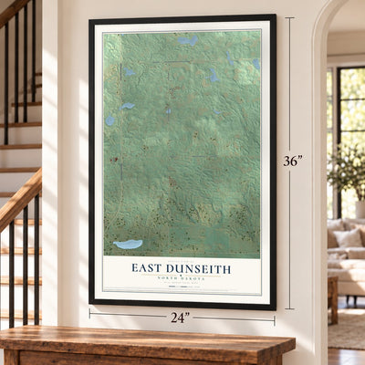 East Dunseith, North Dakota map, 24 x 36 inch print in a black frame by a staircase