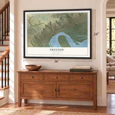 Trenton, North Dakota map, 24 x 36 inch print in a black frame above a dresser by a staircase
