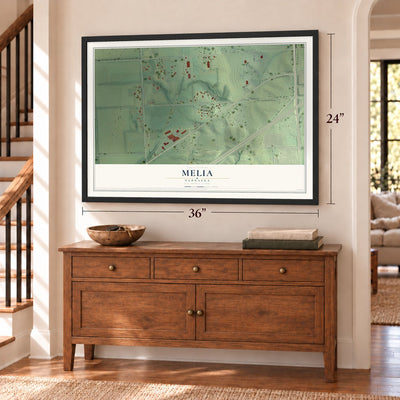 Melia, Nebraska map, 24 x 36 inch print in a black frame above a dresser by a staircase