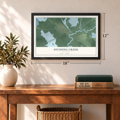 Dividing Creek, New Jersey map, 12 x 18 inch print in a black frame in an entryway