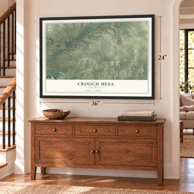 Crouch Mesa, New Mexico map, 24 x 36 inch print in a black frame above a dresser by a staircase