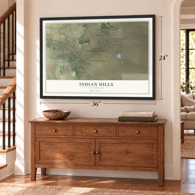 Indian Hills, New Mexico map, 24 x 36 inch print in a black frame above a dresser by a staircase