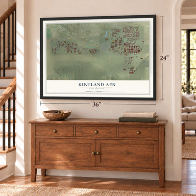 Kirtland AFB, New Mexico map, 24 x 36 inch print in a black frame above a dresser by a staircase