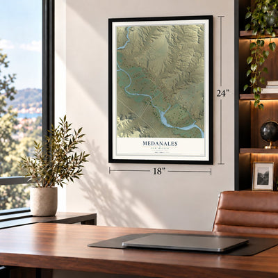Medanales, New Mexico map, 18 x 24 inch print in a black frame in a home office