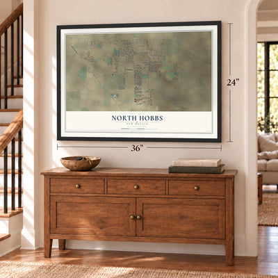 North Hobbs, New Mexico map, 24 x 36 inch print in a black frame above a dresser by a staircase