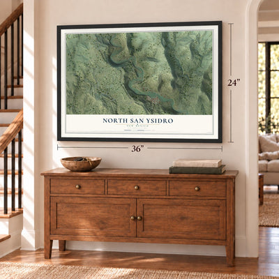 North San Ysidro, New Mexico map, 24 x 36 inch print in a black frame above a dresser by a staircase