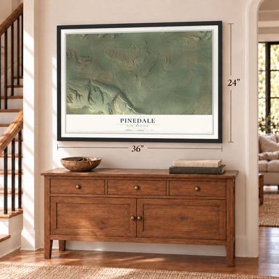 Pinedale, New Mexico map, 24 x 36 inch print in a black frame above a dresser by a staircase