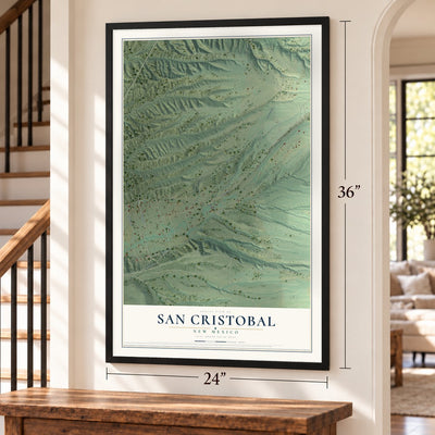 San Cristobal, New Mexico map, 24 x 36 inch print in a black frame by a staircase