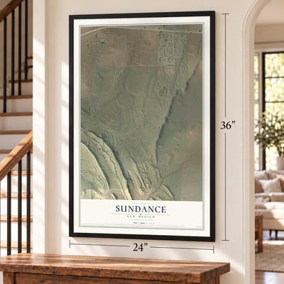 Sundance, New Mexico map, 24 x 36 inch print in a black frame by a staircase