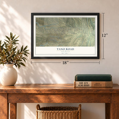 Tano Road, New Mexico map, 12 x 18 inch print in a black frame in an entryway