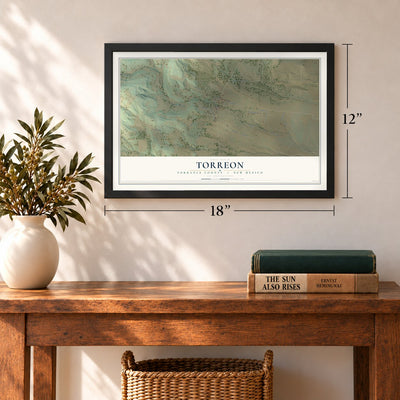 Torreon, New Mexico map, 12 x 18 inch print in a black frame in an entryway