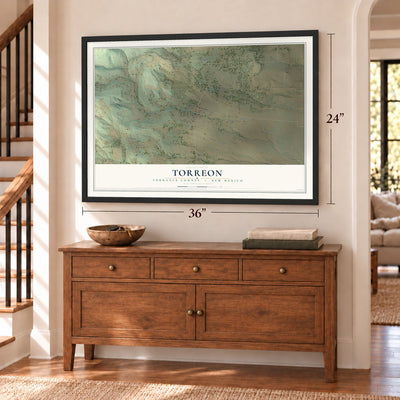 Torreon, New Mexico map, 24 x 36 inch print in a black frame above a dresser by a staircase