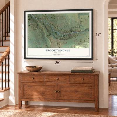 Brooktondale, New York map, 24 x 36 inch print in a black frame above a dresser by a staircase