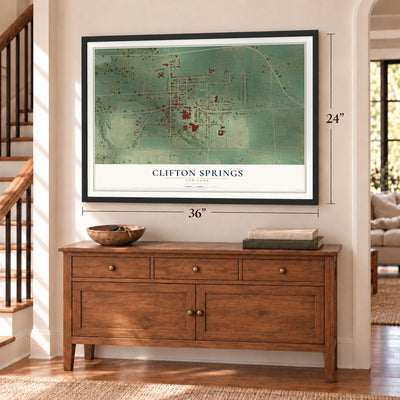 Clifton Springs, New York map, 24 x 36 inch print in a black frame above a dresser by a staircase