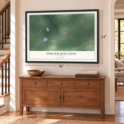 DeKalb Junction, New York map, 24 x 36 inch print in a black frame above a dresser by a staircase
