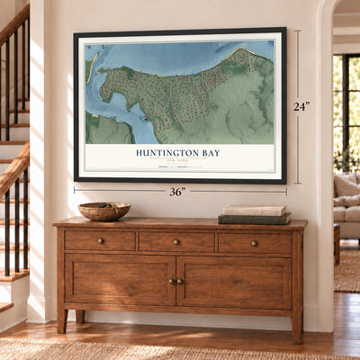Huntington Bay, New York map, 24 x 36 inch print in a black frame above a dresser by a staircase