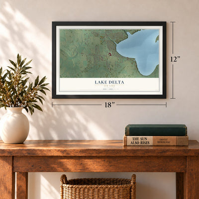 Lake Delta, New York map, 12 x 18 inch print in a black frame in an entryway