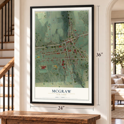 McGraw, New York map, 24 x 36 inch print in a black frame by a staircase