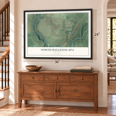 North Ballston Spa, New York map, 24 x 36 inch print in a black frame above a dresser by a staircase