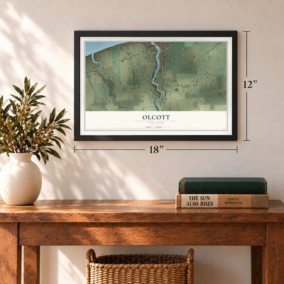 Olcott, New York map, 12 x 18 inch print in a black frame in an entryway