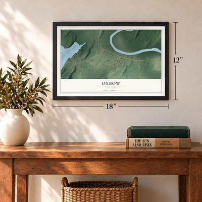 Oxbow, New York map, 12 x 18 inch print in a black frame in an entryway