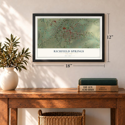 Richfield Springs, New York map, 12 x 18 inch print in a black frame in an entryway