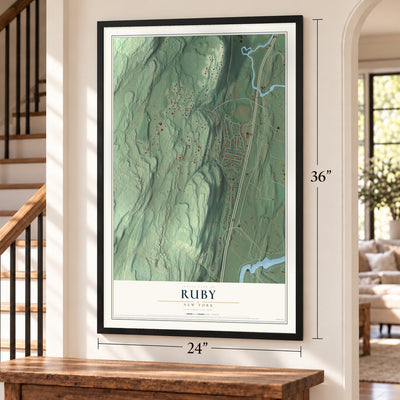 Ruby, New York map, 24 x 36 inch print in a black frame by a staircase