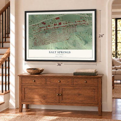 Salt Springs, New York map, 24 x 36 inch print in a black frame above a dresser by a staircase