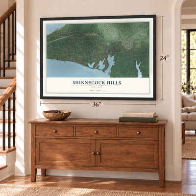 Shinnecock Hills, New York map, 24 x 36 inch print in a black frame above a dresser by a staircase