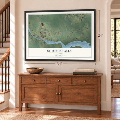St. Regis Falls, New York map, 24 x 36 inch print in a black frame above a dresser by a staircase