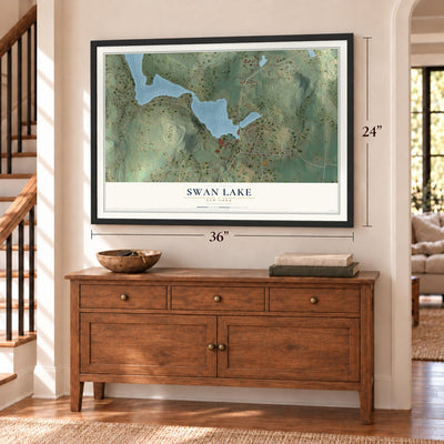 Swan Lake, New York map, 24 x 36 inch print in a black frame above a dresser by a staircase