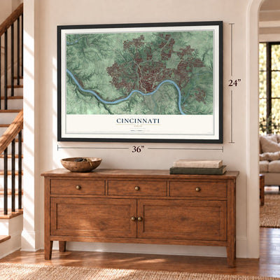 Cincinnati, Ohio Print map, 24 x 36 inch print in a black frame above a dresser by a staircase