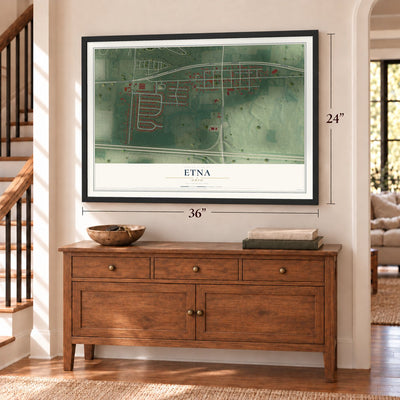 Etna, Ohio map, 24 x 36 inch print in a black frame above a dresser by a staircase