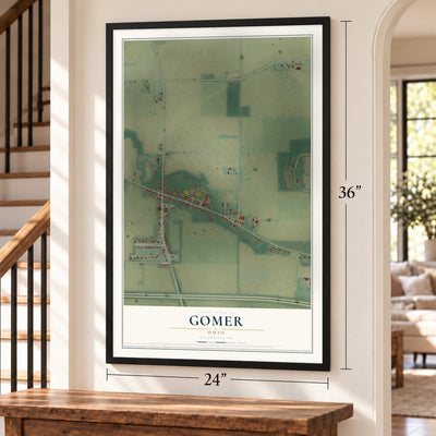 Gomer, Ohio map, 24 x 36 inch print in a black frame by a staircase