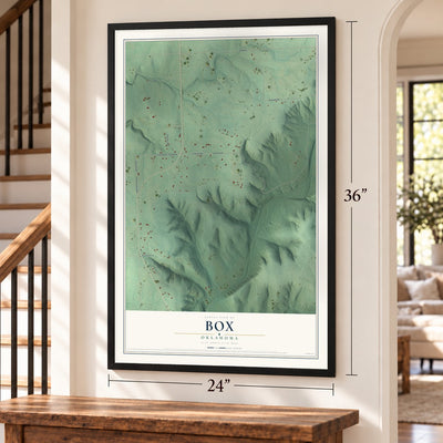 Box, Oklahoma map, 24 x 36 inch print in a black frame by a staircase