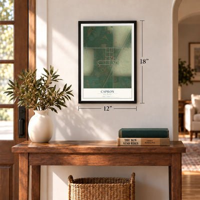 Capron, Oklahoma map, 12 x 18 inch print in a black frame in an entryway