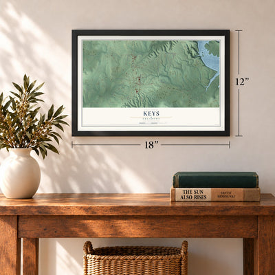 Keys, Oklahoma map, 12 x 18 inch print in a black frame in an entryway