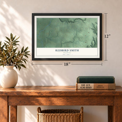 Redbird Smith, Oklahoma map, 12 x 18 inch print in a black frame in an entryway