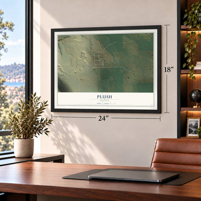 Plush, Oregon map, 18 x 24 inch print in a black frame in a home office
