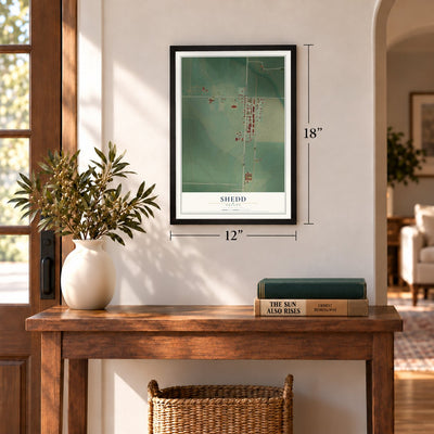 Shedd, Oregon map, 12 x 18 inch print in a black frame in an entryway