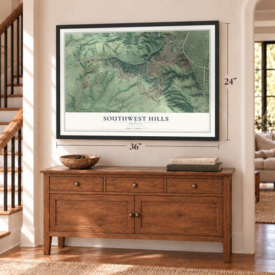 Southwest Hills, Oregon map, 24 x 36 inch print in a black frame above a dresser by a staircase